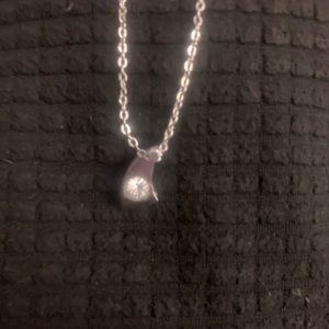 Delicate and fine silver necklace pendant